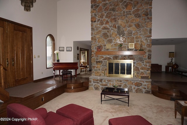 6760 Bear Creek Blvd, Bear Creek Township, PA 18702 - carpeted living room with a fireplace and a high ceiling