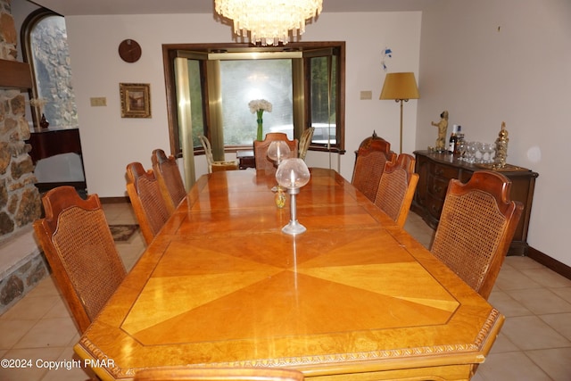 6760 Bear Creek Blvd, Bear Creek Township, PA 18702 - dining area featuring an inviting chandelier and light tile patterned flooring