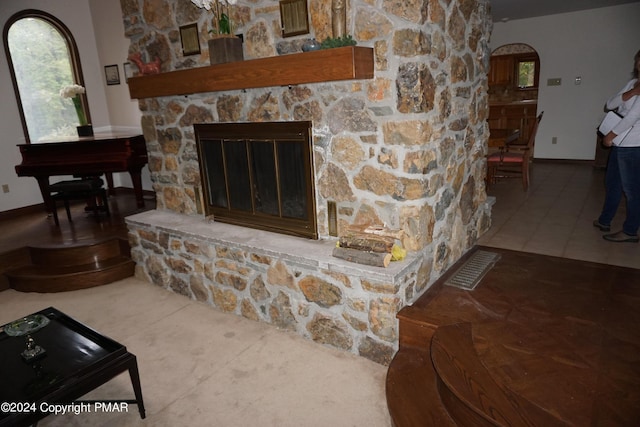 6760 Bear Creek Blvd, Bear Creek Township, PA 18702 - interior details with baseboards, a stone fireplace, and arched walkways