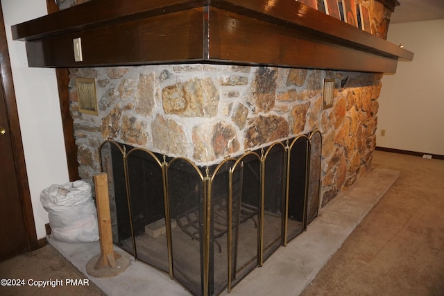 6760 Bear Creek Blvd, Bear Creek Township, PA 18702 - room details featuring baseboards, a stone fireplace, and carpet floors