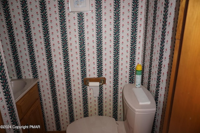 6760 Bear Creek Blvd, Bear Creek Township, PA 18702 - half bathroom featuring toilet and vanity