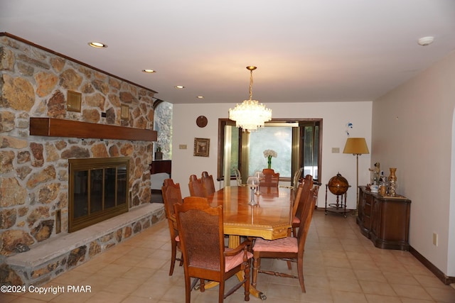 6760 Bear Creek Blvd, Bear Creek Township, PA 18702 - dining space featuring light tile patterned floors, a fireplace, a chandelier, and recessed lighting