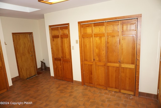 6760 Bear Creek Blvd, Bear Creek Township, PA 18702 - unfurnished bedroom with baseboards and a skylight
