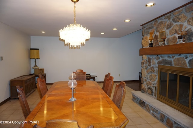 6760 Bear Creek Blvd, Bear Creek Township, PA 18702 - dining space with an inviting chandelier, light tile patterned floors, a stone fireplace, and recessed lighting