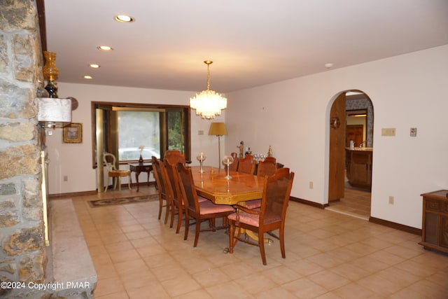 6760 Bear Creek Blvd, Bear Creek Township, PA 18702 - dining room featuring baseboards, arched walkways, and recessed lighting