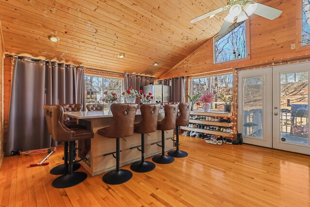 840 Columbus Ave, Stroudsburg, PA 18360 - bar featuring plenty of natural light, a ceiling fan, hardwood / wood-style floors, high vaulted ceiling, and french doors