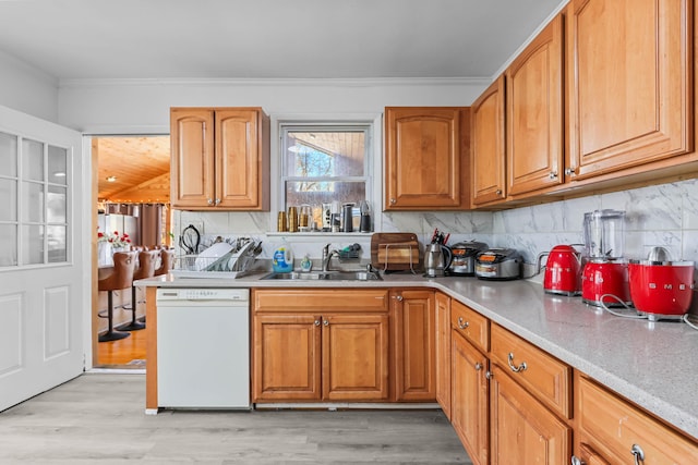 840 Columbus Ave, Stroudsburg, PA 18360 - kitchen with dishwasher, a sink, ornamental molding, backsplash, and light wood-style flooring