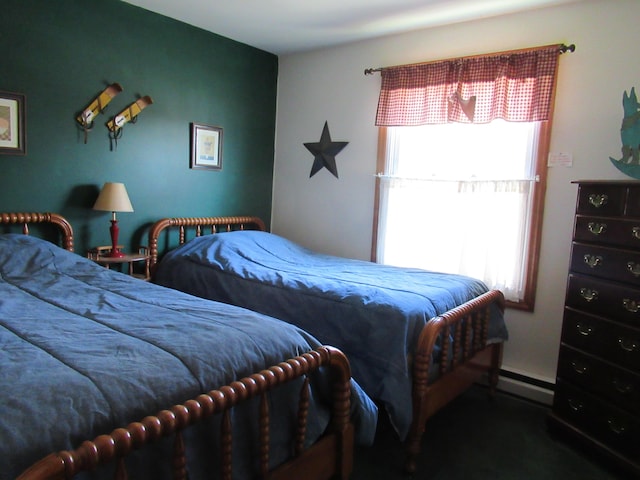 bedroom featuring a baseboard radiator