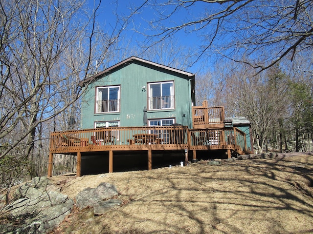 exterior space featuring a wooden deck