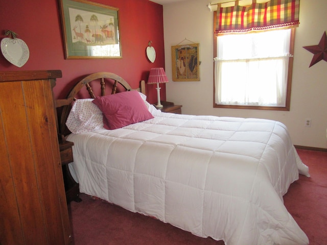 bedroom featuring carpet