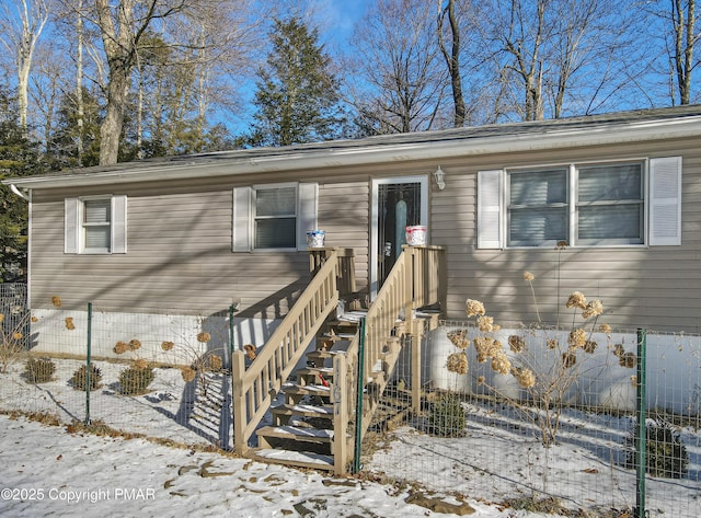 view of front of home with stairway