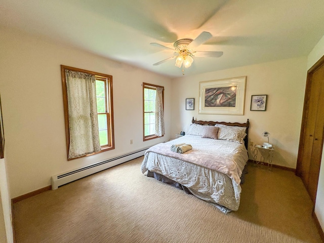 439 Cedar Dr, Long Pond, PA 18334 - bedroom featuring carpet flooring, a baseboard heating unit, baseboards, and ceiling fan