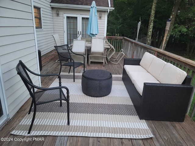 439 Cedar Dr, Long Pond, PA 18334 - wooden terrace with an outdoor hangout area, french doors, and outdoor dining space