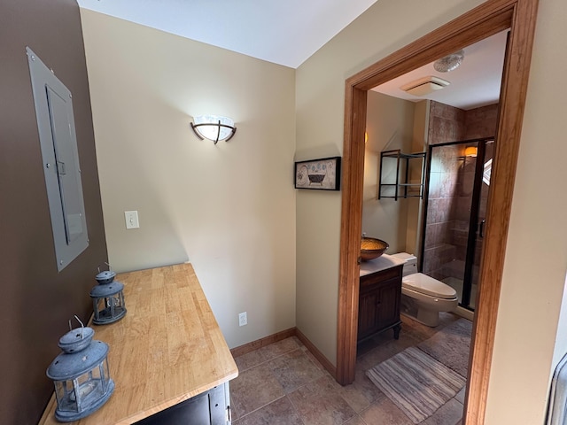 439 Cedar Dr, Long Pond, PA 18334 - bathroom featuring vanity, a shower stall, toilet, and baseboards