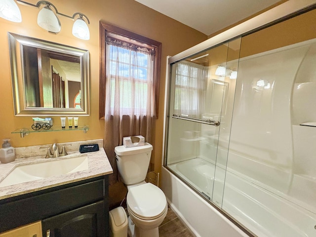 439 Cedar Dr, Long Pond, PA 18334 - full bath featuring toilet, vanity, and bath / shower combo with glass door