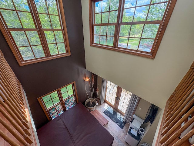 439 Cedar Dr, Long Pond, PA 18334 - living area with a towering ceiling and french doors