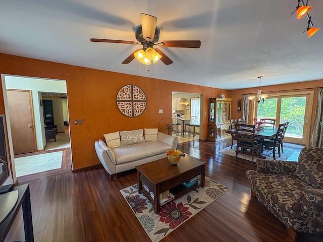 439 Cedar Dr, Long Pond, PA 18334 - living room with wood finished floors, ceiling fan, a chandelier, and baseboards