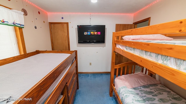 bedroom with dark carpet