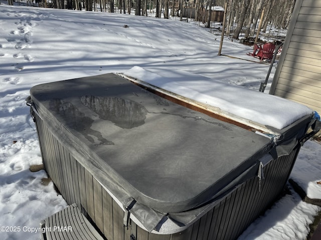 exterior details featuring a jacuzzi