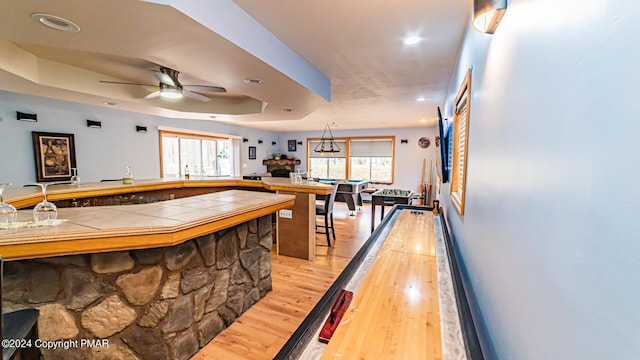 playroom featuring recessed lighting, baseboards, ceiling fan, and light wood finished floors