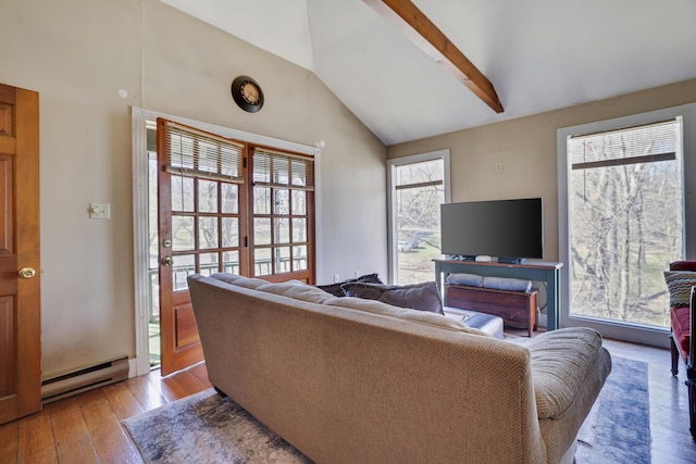 927 Hickory Valley Rd, Stroudsburg, PA 18360 - living room with a baseboard radiator, hardwood / wood-style flooring, and lofted ceiling