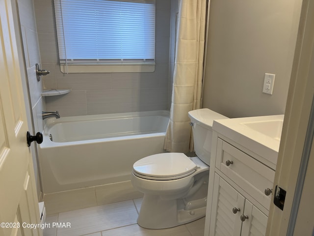 full bath featuring shower / tub combo with curtain, vanity, toilet, and tile patterned floors