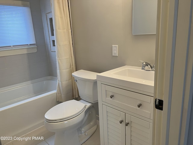 bathroom with toilet, tile patterned floors, shower / bath combination with curtain, and vanity