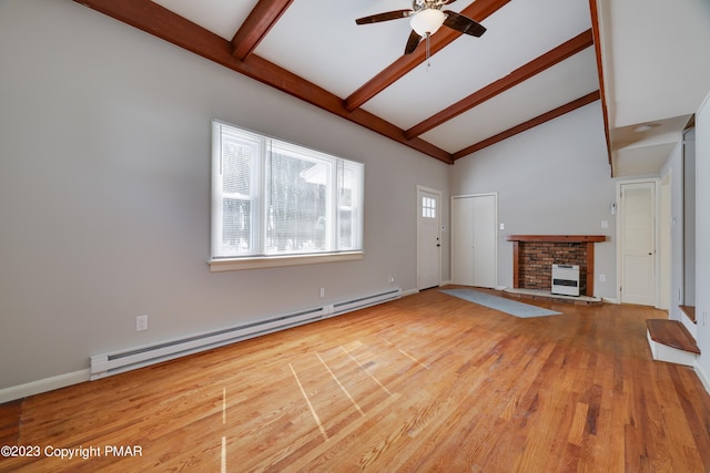 unfurnished living room with a baseboard radiator, a fireplace with raised hearth, a ceiling fan, wood finished floors, and beamed ceiling