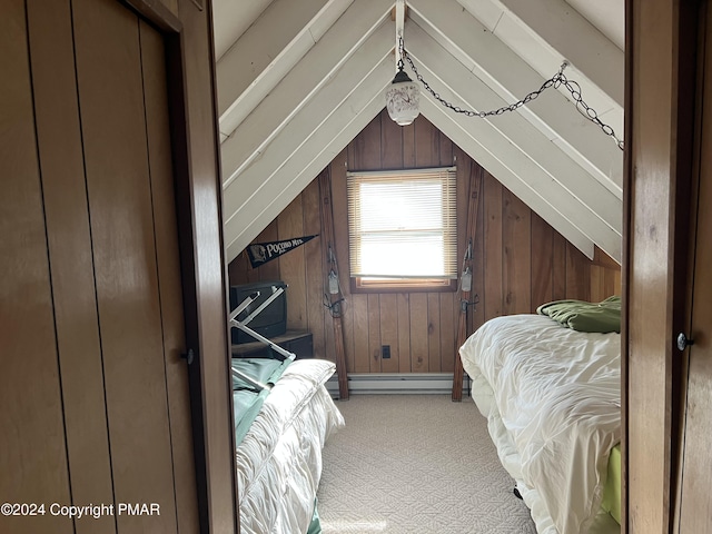 bedroom with light carpet, wood walls, a baseboard radiator, and lofted ceiling