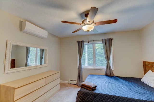bedroom with a baseboard radiator, a wall unit AC, light colored carpet, and ceiling fan