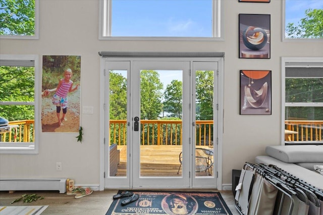 325 Chestnut Rd, East Stroudsburg, PA 18302 - entryway featuring a baseboard heating unit and wood finished floors
