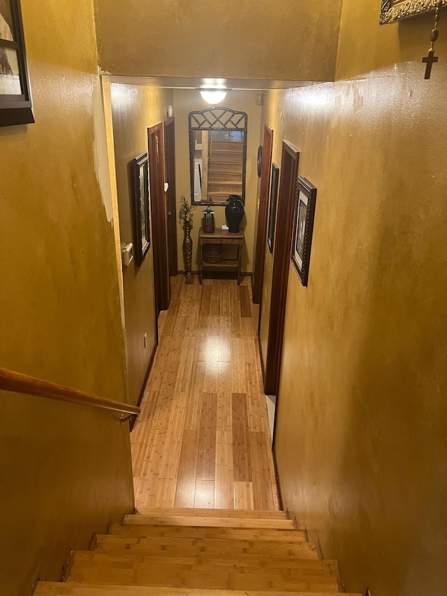 5112 Navajo Pl, Tobyhanna, PA 18466 - hallway featuring light wood finished floors and stairway