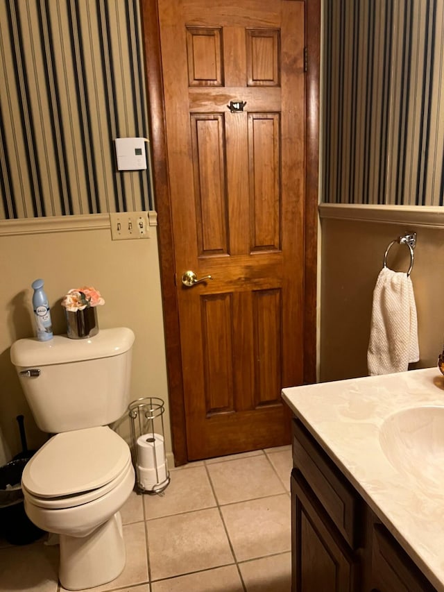 5112 Navajo Pl, Tobyhanna, PA 18466 - bathroom featuring vanity, tile patterned flooring, and wallpapered walls