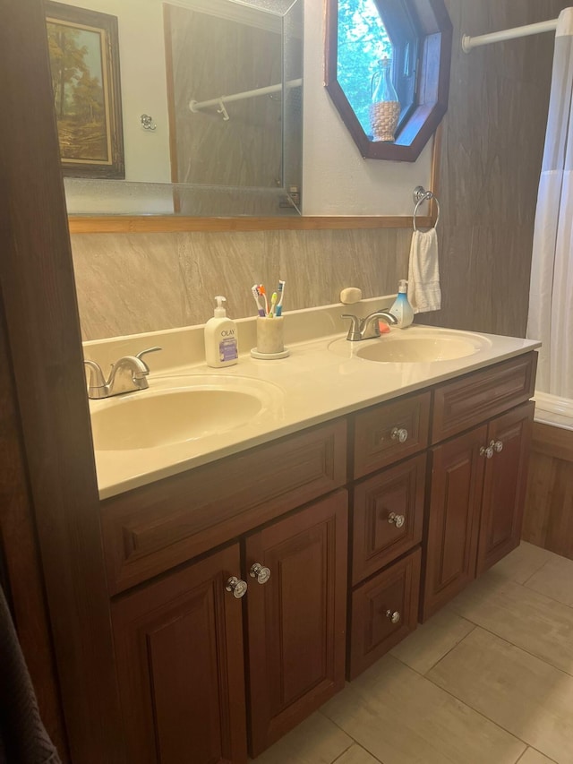 5112 Navajo Pl, Tobyhanna, PA 18466 - full bathroom with double vanity, a shower with curtain, and tile patterned flooring