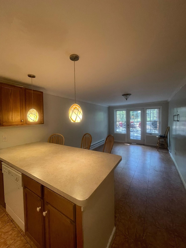5112 Navajo Pl, Tobyhanna, PA 18466 - kitchen with dishwasher, a peninsula, brown cabinetry, and light countertops