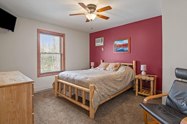 carpeted bedroom with a wall mounted air conditioner, baseboards, and a ceiling fan