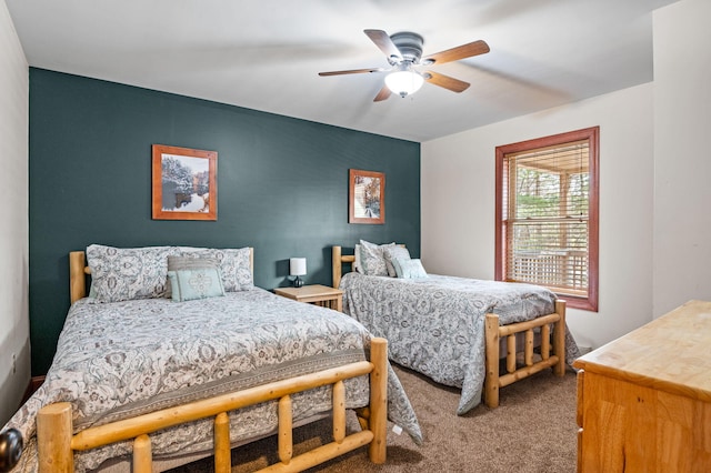 bedroom with carpet flooring and a ceiling fan