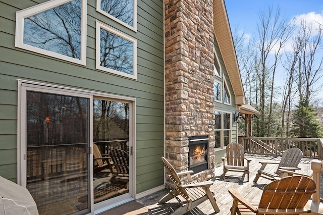 view of patio / terrace with an outdoor brick fireplace