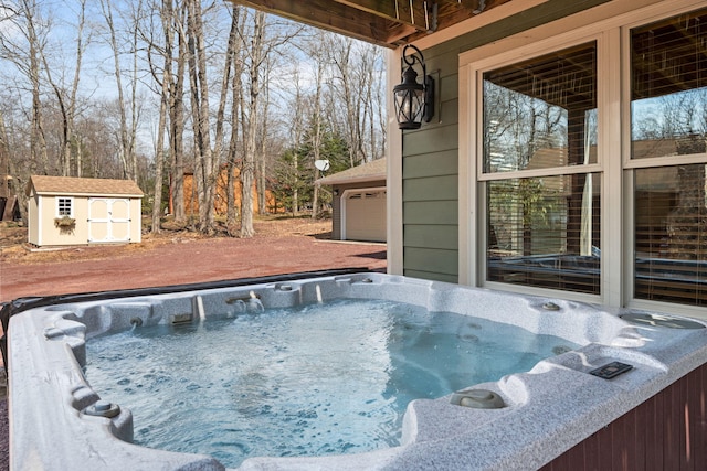 exterior space featuring a storage unit, a garage, an outdoor structure, and a hot tub