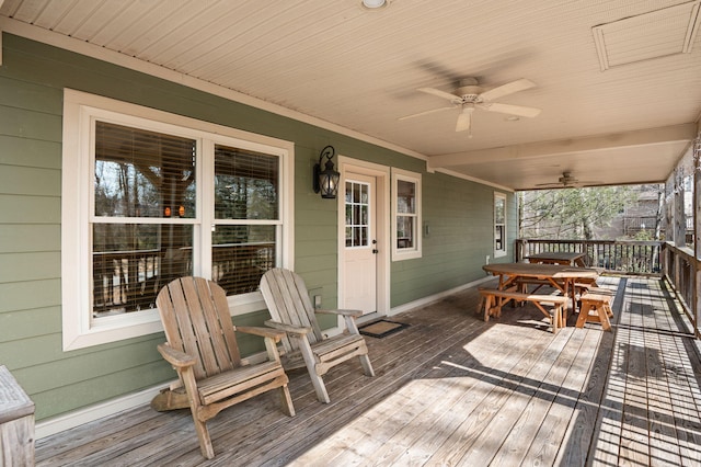 deck with a porch and a ceiling fan