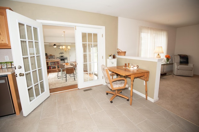 home office featuring light carpet, visible vents, french doors, and baseboards