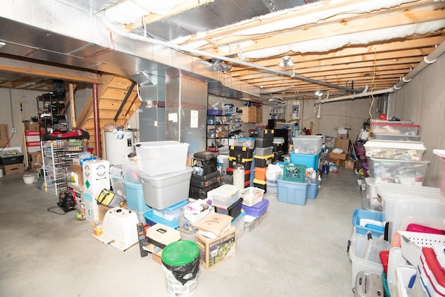 unfinished basement with water heater