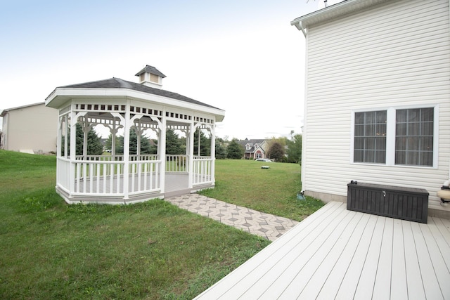 view of yard featuring a gazebo and a wooden deck