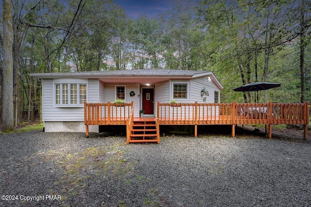 view of front of house with a deck