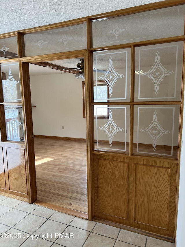 room details featuring wood-type flooring and ceiling fan