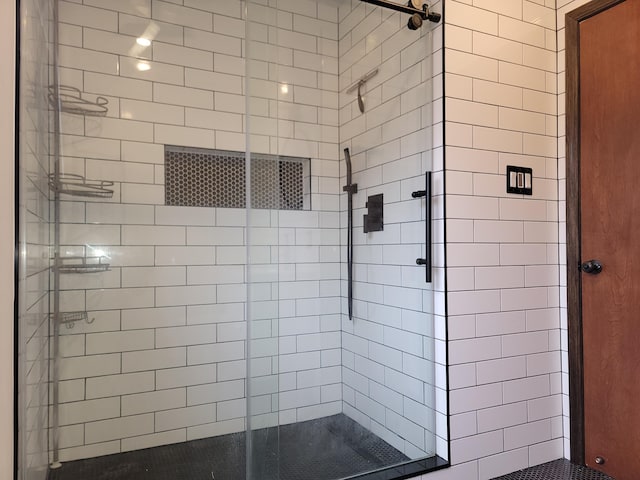 bathroom featuring a stall shower