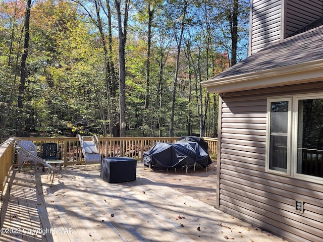 21 Cherry Ct, Clifton Township, PA 18424 - deck featuring a forest view