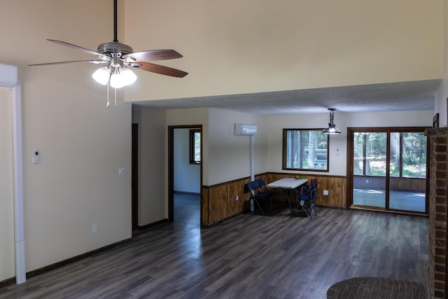 371 Ridge Cir, Cresco, PA 18326 - living room with wood finished floors, wainscoting, ceiling fan, and wood walls