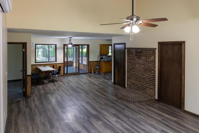 371 Ridge Cir, Cresco, PA 18326 - living room featuring dark wood-style flooring, wainscoting, a wall unit AC, and ceiling fan