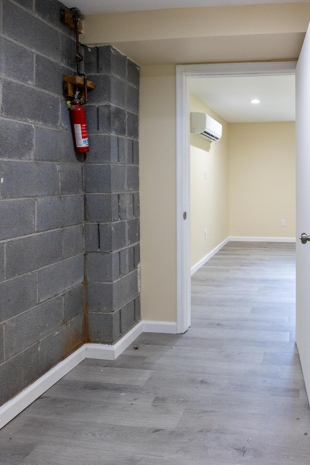 371 Ridge Cir, Cresco, PA 18326 - hall featuring a wall unit AC and wood finished floors